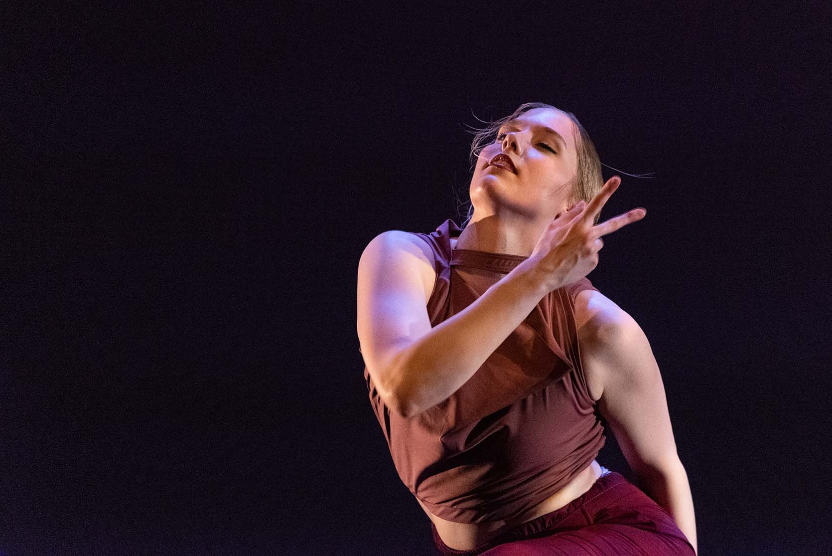 Rebekah Petersen performs ‘lOve,’ choreographed by Elizabeth Pease. In this number, the dancers take viewers on a journey through the beauty of human experience.