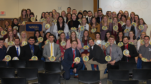 Photos by Cody Moslander Greek members who achieved a 4.0 GPA in the fall semester of 2016 show off their cookies. 