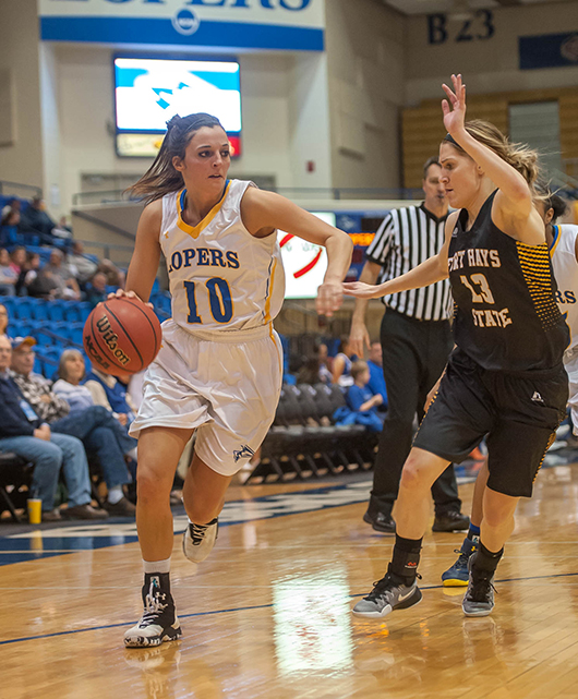 Sophomore guard McKenzie Brown drives up the court past a Fort Hays defender during the Lady Lopers’ game against the Tigers. UNK lost 51-57. The Lady Lopers are currently 5-12 (1-8 in the MIAA) and will play at home again Thursday Jan. 26 at 5:30 against Lindenwold University (7-10, 3-7).