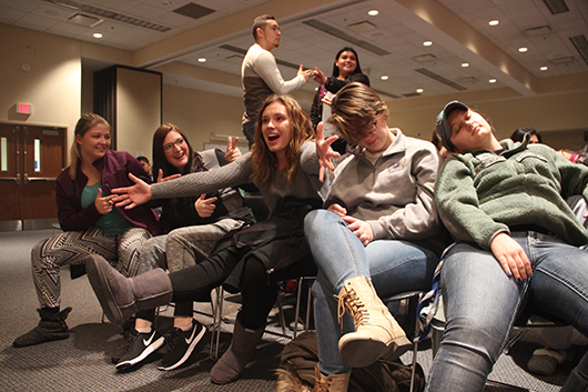 Photo by Jessica Turek 5. Students choose creative poses during Jim Wand’s Facebook Live mannequin challenge. Soon after, Wand chose around 20 volunteer subjects to place under a hypnotic state. Wand started shows in Kearney before he became a full-time stage hypnotist, making UNK one of his longest-running venues. 