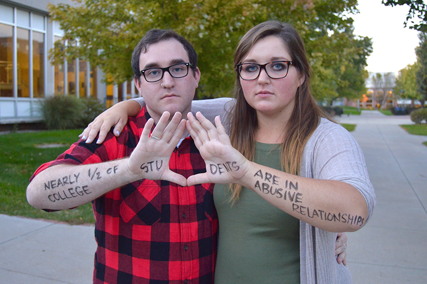 Photo by Rachel Arehart Robert Alberts participates in a Women’s Center social media promotion with coworker Bailey Bond. Student leaders on campus were photographed with powerful messages written on their arms and hands. Alberts is the Women’s Center graduate intern. They work primarily with LGBTQIA issues and finding undergraduate help for the office. Alberts will remain as a part of the Women’s Center team until May.