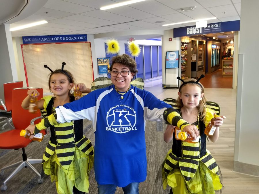Some+younger+members+of+the+Arc+pose+in+bee+costumes+before+going+out+into+the+community+to+help+sell+honey+bears+and+get+donations.
