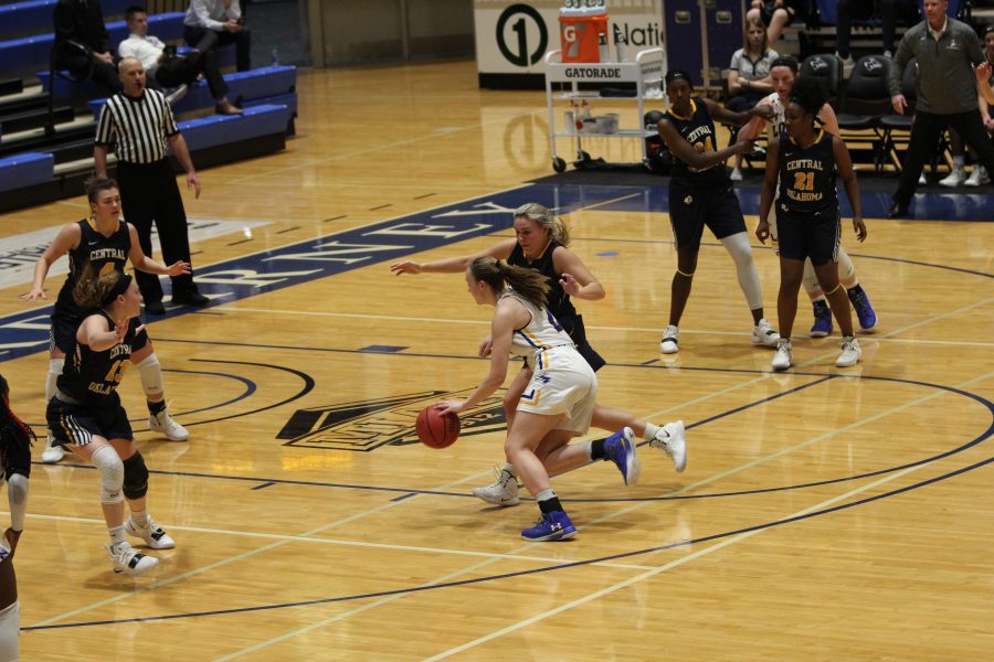 Freshman Shiloh McCool drives past a Broncho defender. McCool was 2 points short of a double-doube, finishing with 8 points and 10 rebounds.