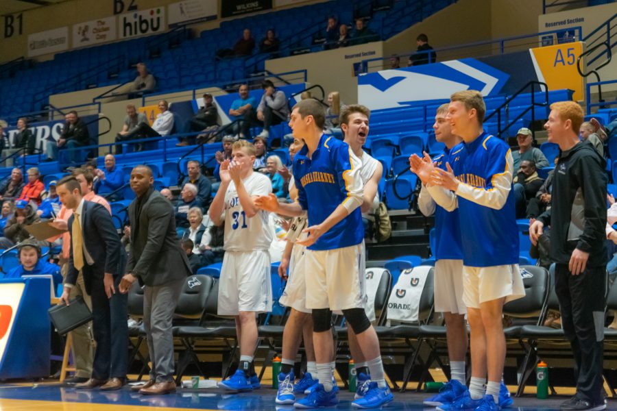 Carter Burns and team cheer on their fellow Lopers