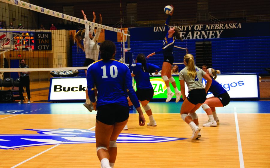 Loper volleyball spiking the ball