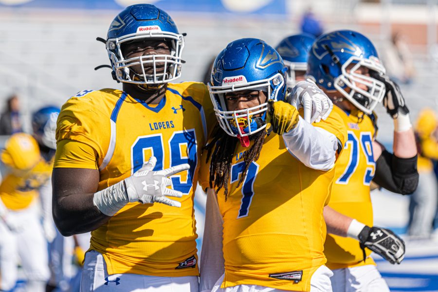 UNK football keeps bowl hopes alive with win