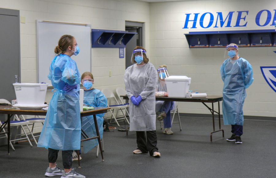 Students and faculty help with random COVID-19 testing that is administered on UNK’s campus.