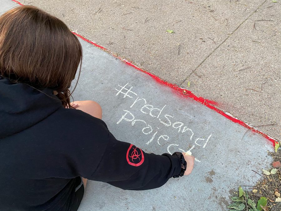 The International Justice Mission members covered the sidewalks to raise awareness.