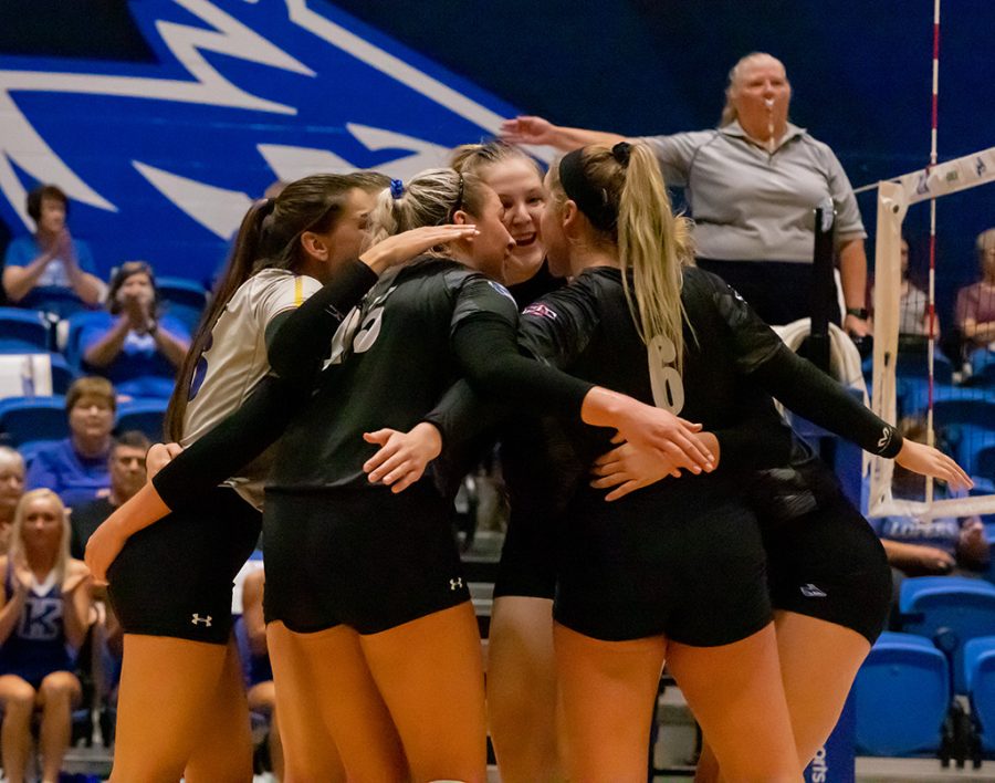 The Loper Volleyball team celebrates together after scoring a point. (Photo by Jiyoon Kim)