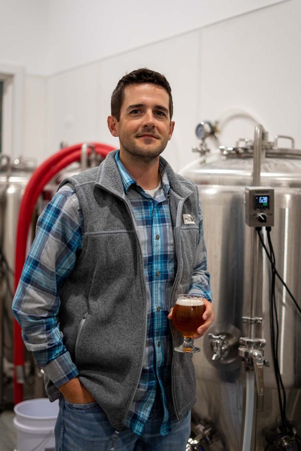 Dustin+Favinger%2C+a+UNK+lecturer%2C+channels+his+passion+for+brewery+as+a+co-owner+of+a+bar+in+Downtown+Kearney.