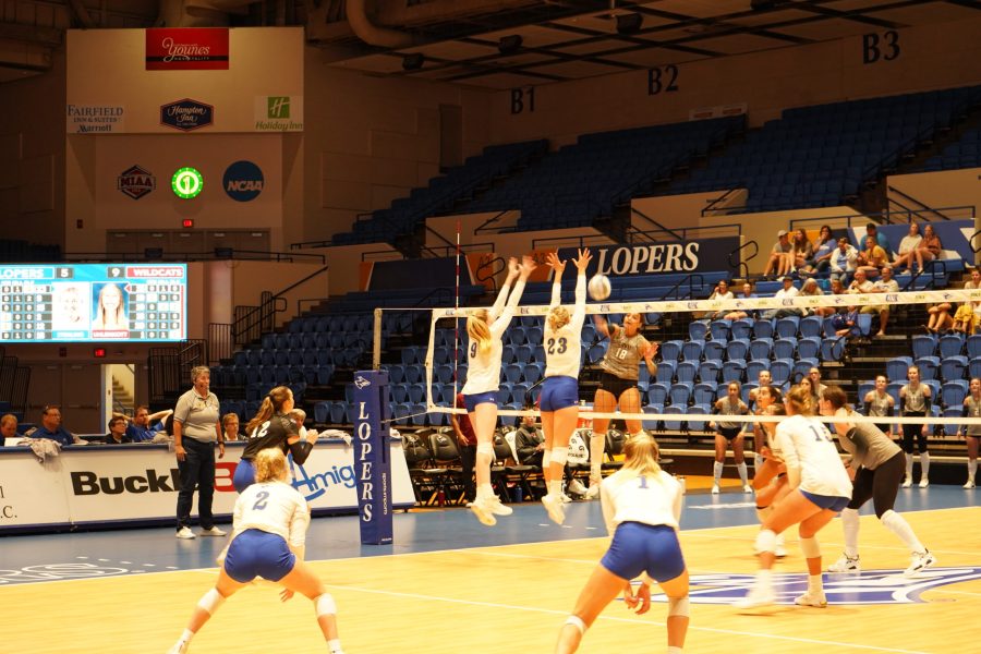 Lauren Taubenheim and Bailee Sterling go up to block the Central Washington attack. 