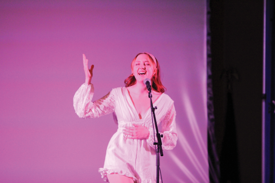 Laura Konz sings Hopelessly Devoted to You by Olivia Newton-John. Photo by Shelby Berglund / Antelope Staff