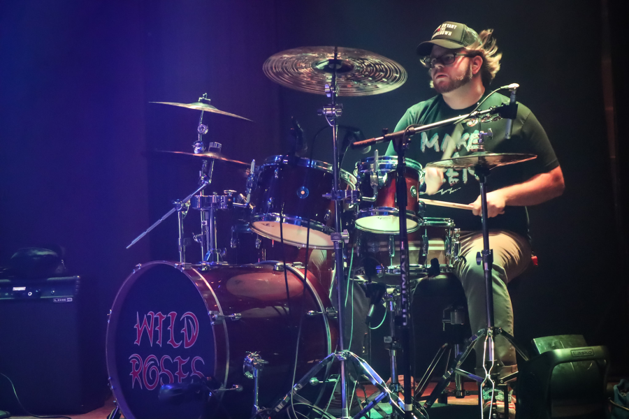 Steven Koehn keeping rhythm for the Wild Roses Band. Photo courtesy of Wild Roses
