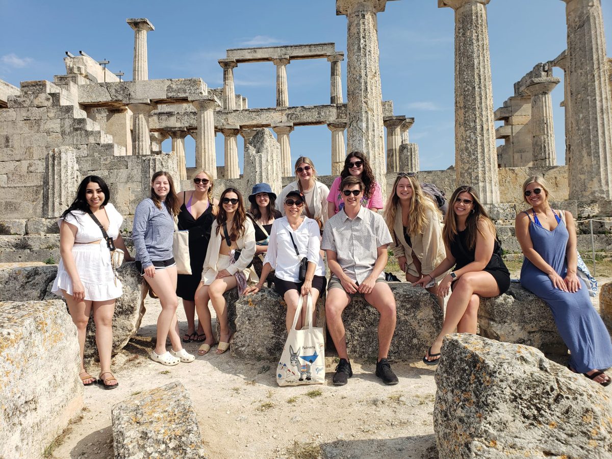 Students pose with the Temple of Aphaia behind them. Courtesy Photo