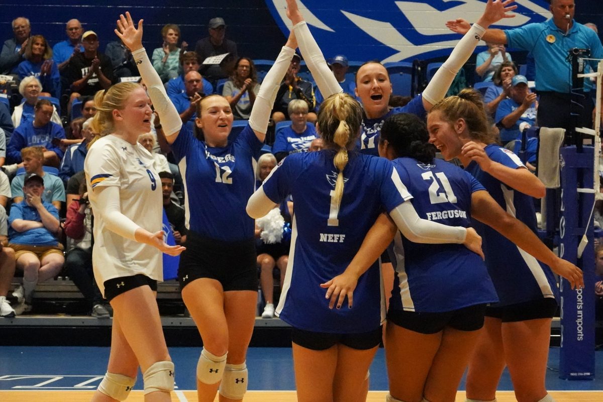 Loper volleyball players celebrate during the teams 3-1 victory over Pitt State on Friday. Photo by Shelby Berglund / Antelope Staff