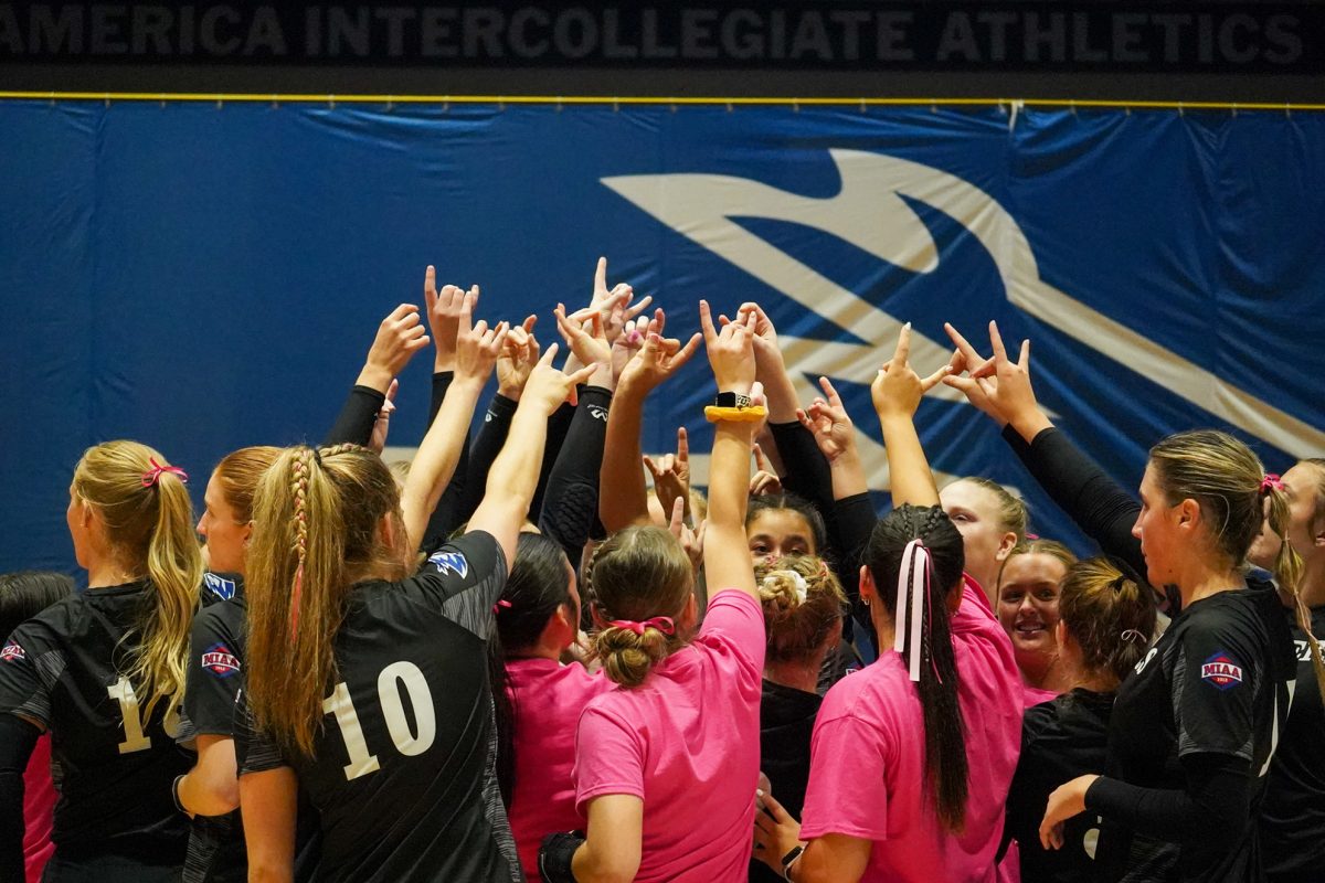 Loper+volleyball+players+celebrate+after+defeating+Washburn+at+home+this+season.+Photo+by+Shelby+Berglund+%2F+Antelope+Staff