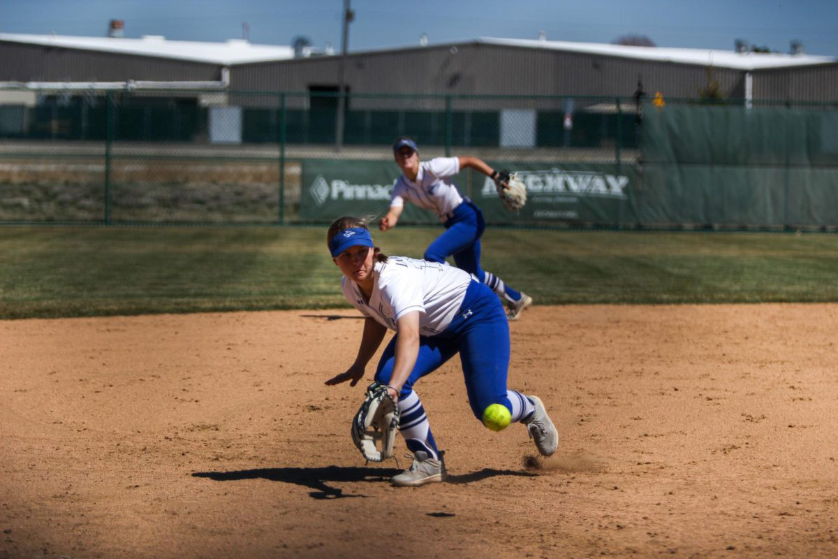Alyssa Fortik backhands a ground ball during UNKs series against Washburn. Photo by Traeton Harimon / Antelope Staff