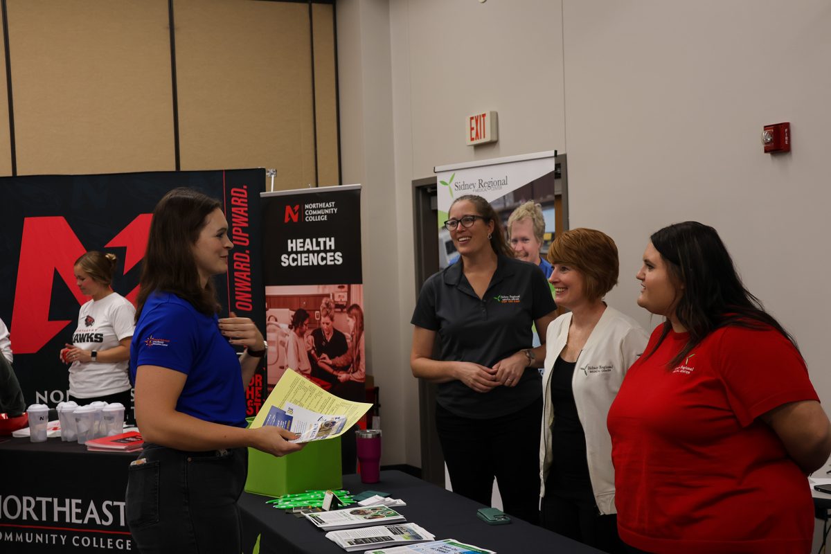 Elly Piper networks with Sidney Regional Medical Center. Photo by Jenna Heinz / Antelope Staff