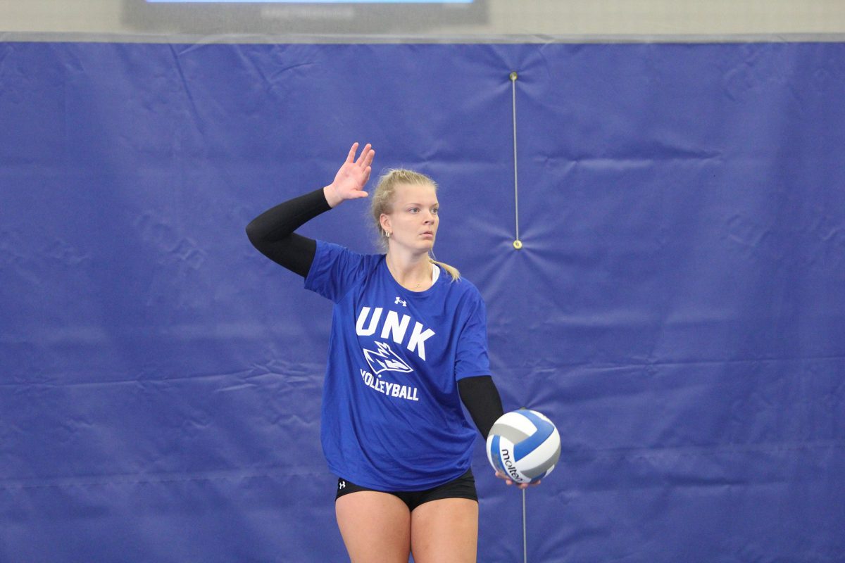 Freshman Lizzy Spah practices serves in preparation for the UNK fall classic. Photo by Jon Willis / Antelope Staff