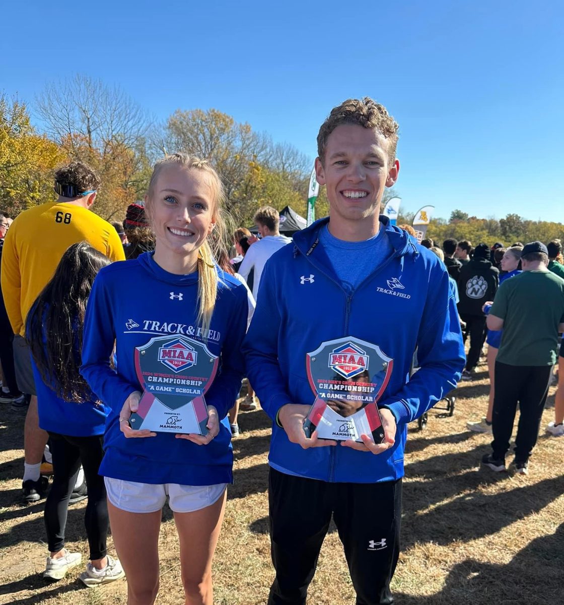 Mara Hemmer and Tanner Cooper were honored before the race as this year's Mammoth "A" Game Winners in MIAA cross country. Photo courtesy of Tanner Cooper