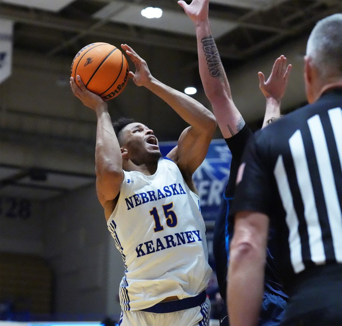 Chase Thompson goes for the basket in the Loper's game against South Dakota. Photo by Gabby Roche / Antelope Staff