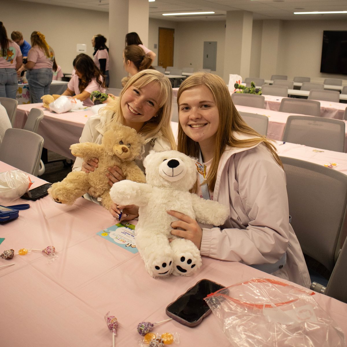 Haley Wiemers and Kalli Niemann create  their own bears. Photo by Lily Roby / Antelope Staff